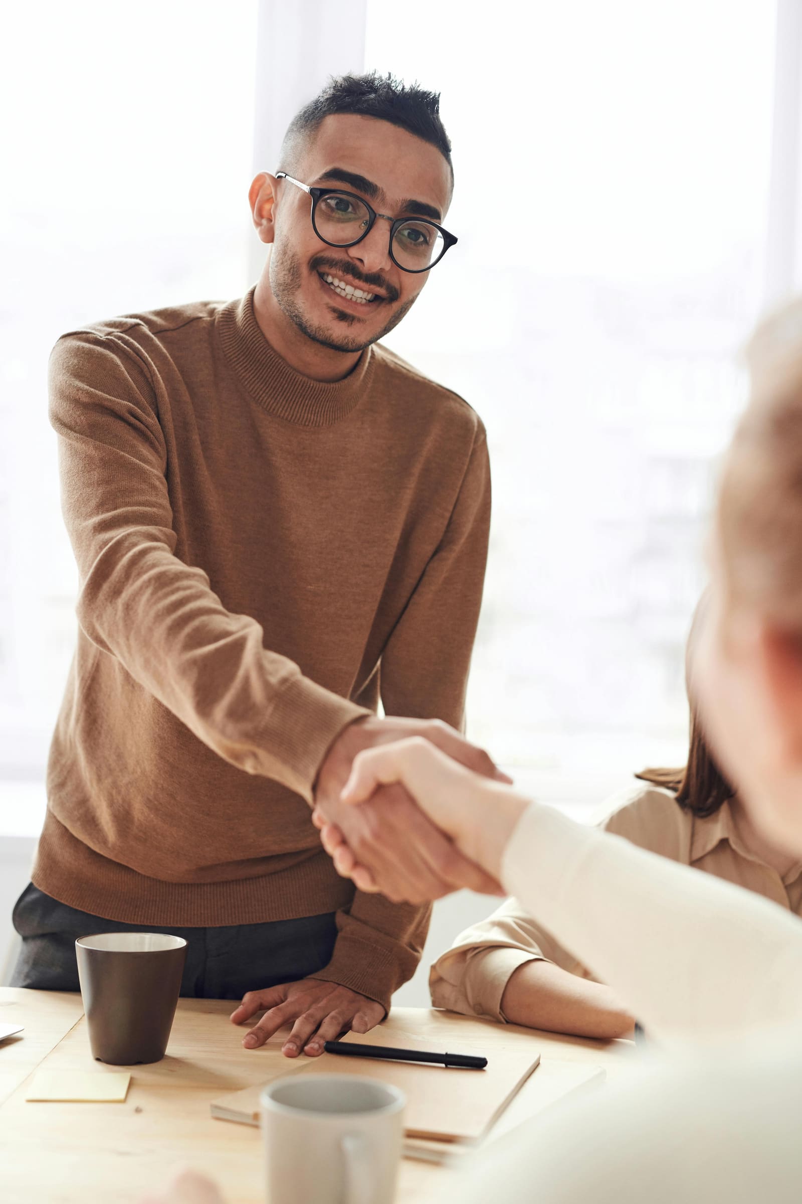 Two people shaking hands